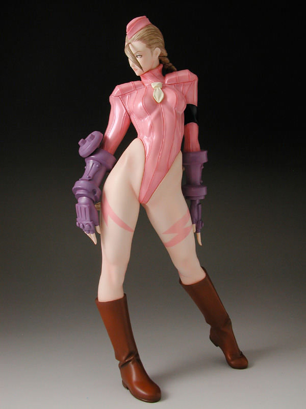 cammy white, capcom, street fighter, light brown hair, photo (medium), 1girl, ahoge, armband, armor, beret, blonde hair, bodysuit, boots, braid, breasts, contrapposto, female focus, figure, fingerless gloves, full body, garrison cap, gloves, gradient background, groin, hat, highleg, highleg leotard, hip bones, hip focus, knee boots, legs apart, leotard, lightning bolt symbol, long hair, long sleeves, looking to the side, medium breasts, necktie, pink hat, purple gloves, shadow, shoulder pads, small breasts, solo, standing, tattoo, tiptoes, turtleneck, vambraces