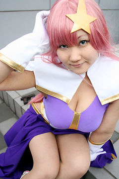 meer campbell, gundam, gundam seed, gundam seed destiny, cosplay photo, lowres, photo (medium), 1girl, cosplay, female focus, hair ornament, solo, star (symbol), star hair ornament