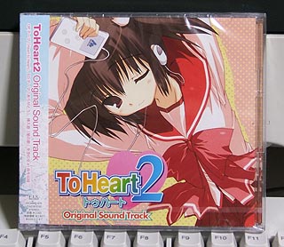 amazuyu tatsuki, yuzuhara konomi, to heart (series), to heart 2, lowres, official art, photo (medium), 00s, 1girl, ;), album cover, arms up, black hair, bow, breasts, brown hair, cable, closed mouth, company name, computer keyboard, copyright name, cover, cowboy shot, digital media player, dutch angle, english text, female focus, hair between eyes, headphones, heart, holding, light smile, listening to music, logo, long sleeves, looking at viewer, one eye closed, pink background, pleated skirt, polka dot, polka dot background, red bow, red eyes, red skirt, school uniform, serafuku, shadow, shirt, short twintails, skirt, small breasts, smile, solo, twintails, white shirt