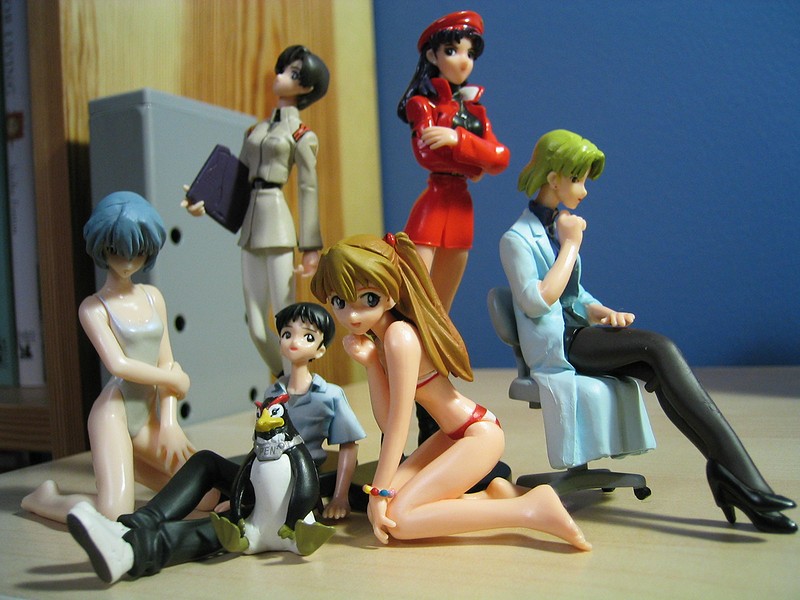 akagi ritsuko, ayanami rei, ibuki maya, ikari shinji, katsuragi misato, penpen, souryuu asuka langley, neon genesis evangelion, arm grab, black legwear, hand on thigh, white legwear, photo (medium), 1boy, 5girls, :d, age difference, ankle boots, arm support, barefoot, belt, beret, bikini, bird, black hair, blonde hair, blue hair, boots, bracelet, casual one-piece swimsuit, chair, crossed arms, earrings, everyone, feet, figure, flat chest, folder, hair between eyes, hair ornament, hat, head rest, high heels, holding, indoors, jacket, jewelry, kneeling, lab coat, leaning forward, lipstick, long hair, looking at viewer, looking back, looking down, looking up, makeup, military, military uniform, miniskirt, multiple girls, name tag, no legwear, office chair, one-piece swimsuit, open mouth, orange hair, pale skin, pants, pantyhose, penguin, profile, reclining, shadow, shirt, shoes, short hair, sitting, skirt, smile, sneakers, spread legs, standing, striped bikini, striped clothes, striped one-piece swimsuit, swimsuit, swivel chair, toy figurines, twintails, two side up
