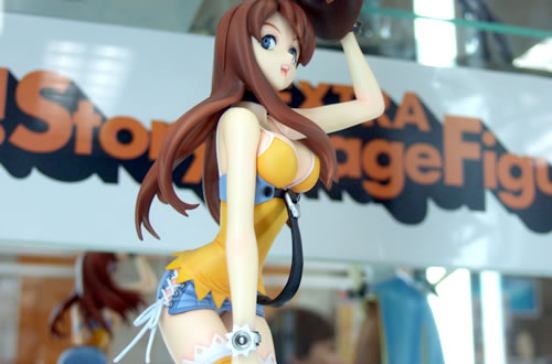 meg (bakuretsu tenshi), akibablog, bakuretsu tenshi, lowres, photo (medium), 00s, 1girl, female focus, figure, hat, holding, holding unworn clothes, holding unworn hat, solo, unworn hat, unworn headwear