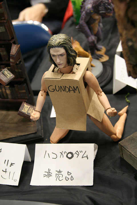 cardboard box gundam, gundam, photo (medium), bottomless, box, cardboard box, cosplay, figure, no pants, what