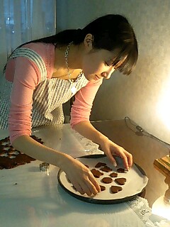 tanaka rie, lowres, photo (medium), 1girl, apron, candy, chocolate, chocolate heart, cookie, female focus, food, heart, qvga, solo