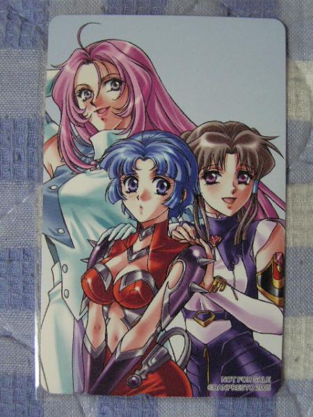 kouno sachiko, kusuha mizuha, minaki tomine, selena recital, banpresto, super robot wars, super robot wars alpha, the 3rd super robot wars alpha, hands on shoulders, official art, photo (medium), 3girls, :d, :o, age difference, ahoge, arm behind head, armpits, blue eyes, blue hair, blunt bangs, blush, breasts, brown hair, buttons, center opening, cleavage, detached sleeves, elbow gloves, gloves, hair tubes, large breasts, lipstick, long hair, makeup, mature female, midriff, minaki, multiple girls, navel, open mouth, parted bangs, phonecard, pink hair, ponytail, purple eyes, short hair, sidelocks, smile, spikes, standing, surprised, turtleneck, white gloves