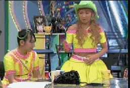kago ai, yaguchi mari, hello! project, minimoni, morning musume, screencap, animated, animated gif, lowres, photo (medium), 2girls, :d, belt, bent over, black hair, brown hair, covering crotch, covering privates, cowboy hat, crop top, cup, double bun, gloves, hair bun, hair ornament, hat, idol, indoors, laughing, long hair, midriff, mug, multiple girls, open mouth, pointing, punching, short hair, sitting, skirt, smile, standing, table, toy hammer, twintails, wavy hair