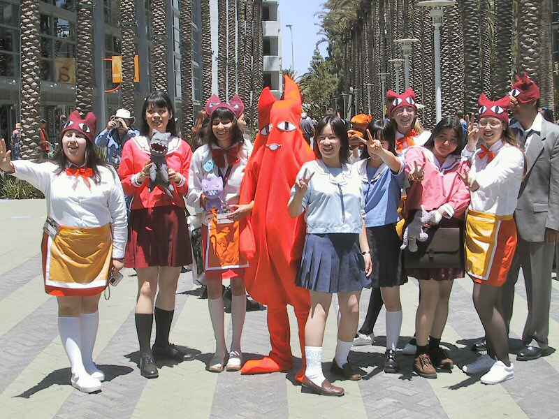 mihama chiyo's father, azumanga daiou, real life, white legwear, cosplay photo, photo (medium), 6+girls, animal ears, black socks, blouse, blue shirt, cosplay, day, everyone, fake animal ears, kneehighs, multiple girls, outdoors, parted bangs, pink shirt, shirt, socks, standing, v, white shirt