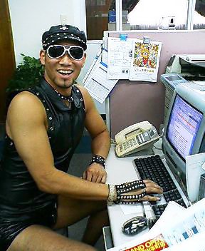 hard gay, lowres, off-topic, photo (medium), bracelet, collar, computer, computer keyboard, hat, imac, jewelry, male focus, newsboy cap, solo, sunglasses