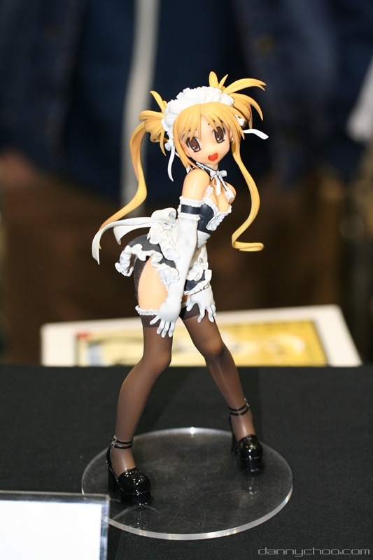 worldhobbyfestival, sawatari mitsuki, kore ga watashi no goshujin-sama, black footwear, photo (medium), 00s, 1girl, arm garter, bare shoulders, blonde hair, brown thighhighs, elbow gloves, female focus, figure, full body, gloves, indoors, looking at viewer, maid, maid headdress, nakabayashi yoshitaka's maid uniform, pigeon-toed, short hair, smile, solo, standing, thighhighs, twintails, white gloves, wind, wind lift