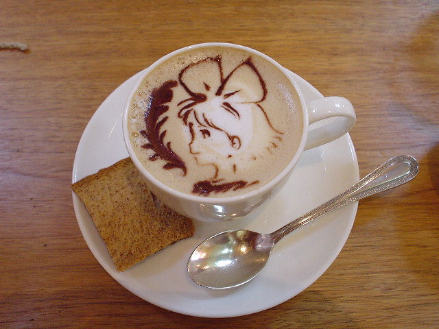 kiki (majo no takkyuubin), majo no takkyuubin, studio ghibli, 1980s (style), food art (medium), latte art (medium), photo (medium), unconventional media, 1girl, bow, coffee, cookie, female focus, food, food focus, hair bow, latte art, oldschool, plate, profile, retro artstyle, solo, spoon, still life, upper body