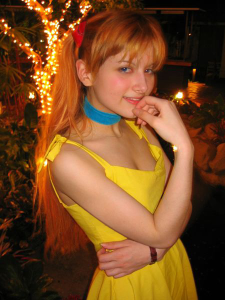 neon genesis evangelion, cosplay photo, photo (medium), 1girl, cosplay, dress, female focus, orange hair, solo, souryuu asuka langley (cosplay), yellow dress
