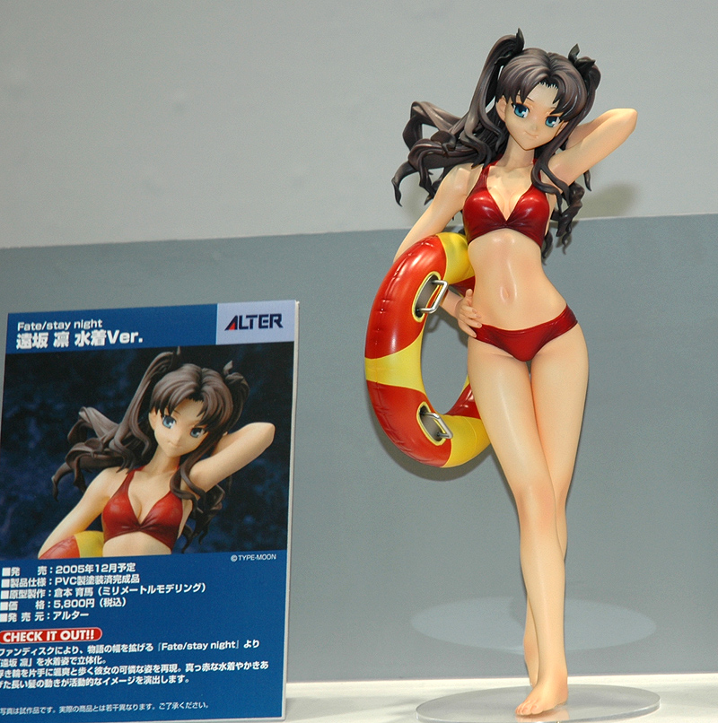 tohsaka rin, fate/stay night, fate (series), wonder festival, wonder festival 2005, photo (medium), 00s, 1girl, barefoot, bikini, female focus, figure, innertube, long legs, solo, swim ring, swimsuit, two side up