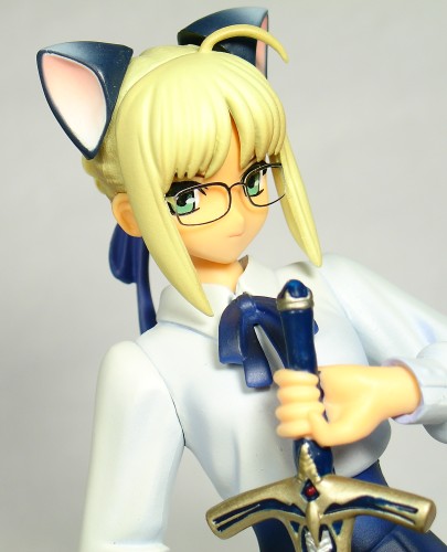 artoria pendragon (fate), saber (fate), fate/stay night, fate (series), lowres, photo (medium), 00s, 1girl, ahoge, animal ears, bespectacled, blonde hair, blouse, caliburn (fate), cat ears, female focus, figure, glasses, shirt, solo, sword, weapon