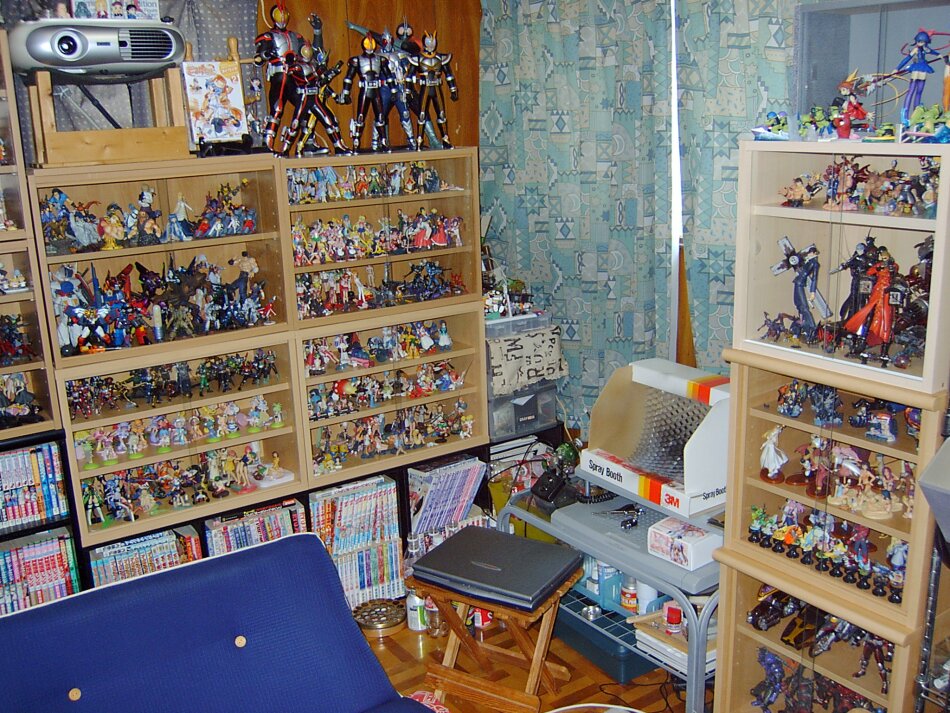 kamen rider, photo (medium), tagme, bookshelf, figure, manga (object), no humans, otaku room