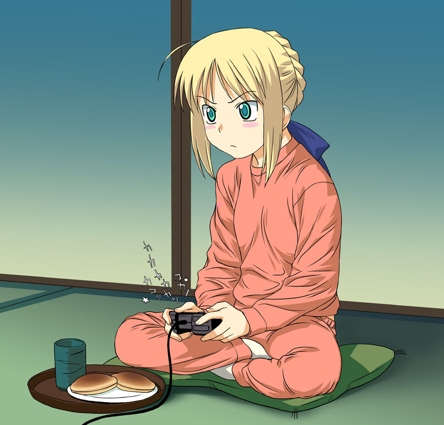 a1 (initial-g), artoria pendragon (fate), saber (fate), fate/stay night, fate (series), 00s, 1girl, ahoge, alternate costume, blonde hair, female focus, flat chest, food, game console, green eyes, green hair, indian style, matching hair/eyes, pillow, playing games, playstation 2, sitting, solo, video game, wagashi