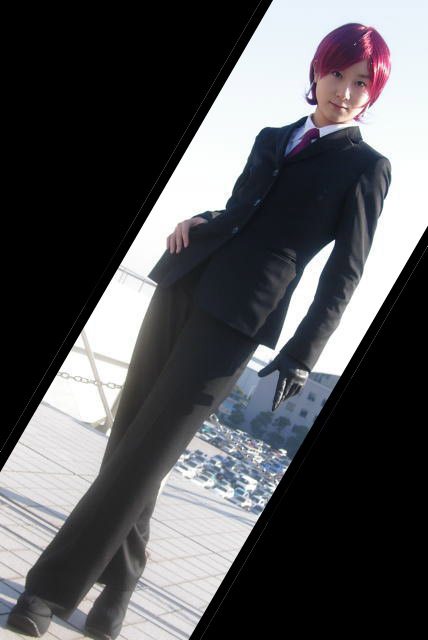 bazett fraga mcremitz, fate/stay night, fate (series), cosplay photo, photo (medium), 1girl, bazett fraga mcremitz (cosplay), black suit, collared shirt, cosplay, earrings, female focus, formal clothes, gloves, jewelry, pant suit, pants, red hair, shirt, short hair, single glove, solo, suit, white shirt