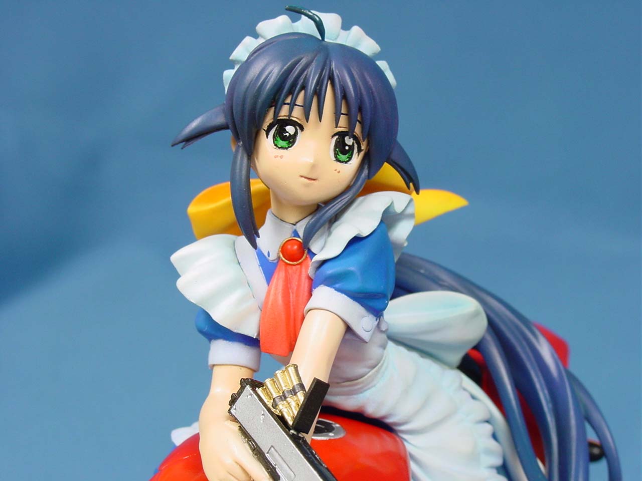 andou mahoro, mahoromatic, vehicle, photo (medium), 1girl, blue hair, female focus, figure, green eyes, gun, maid, motor vehicle, motorcycle, solo, weapon