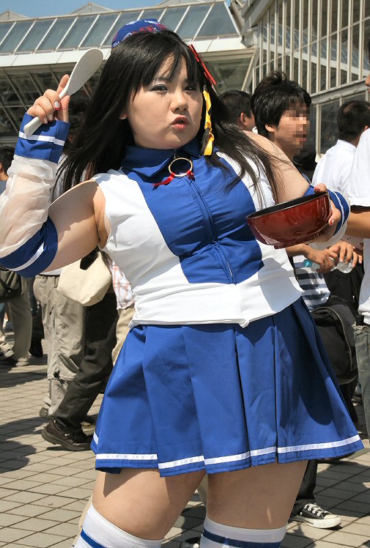 xp-tan, comiket, os-tan, tokyo big sight, cosplay photo, photo (medium), 1girl, blue skirt, censored, cosplay, fat, female focus, mosaic censoring, plump, skirt, solo, thighhighs