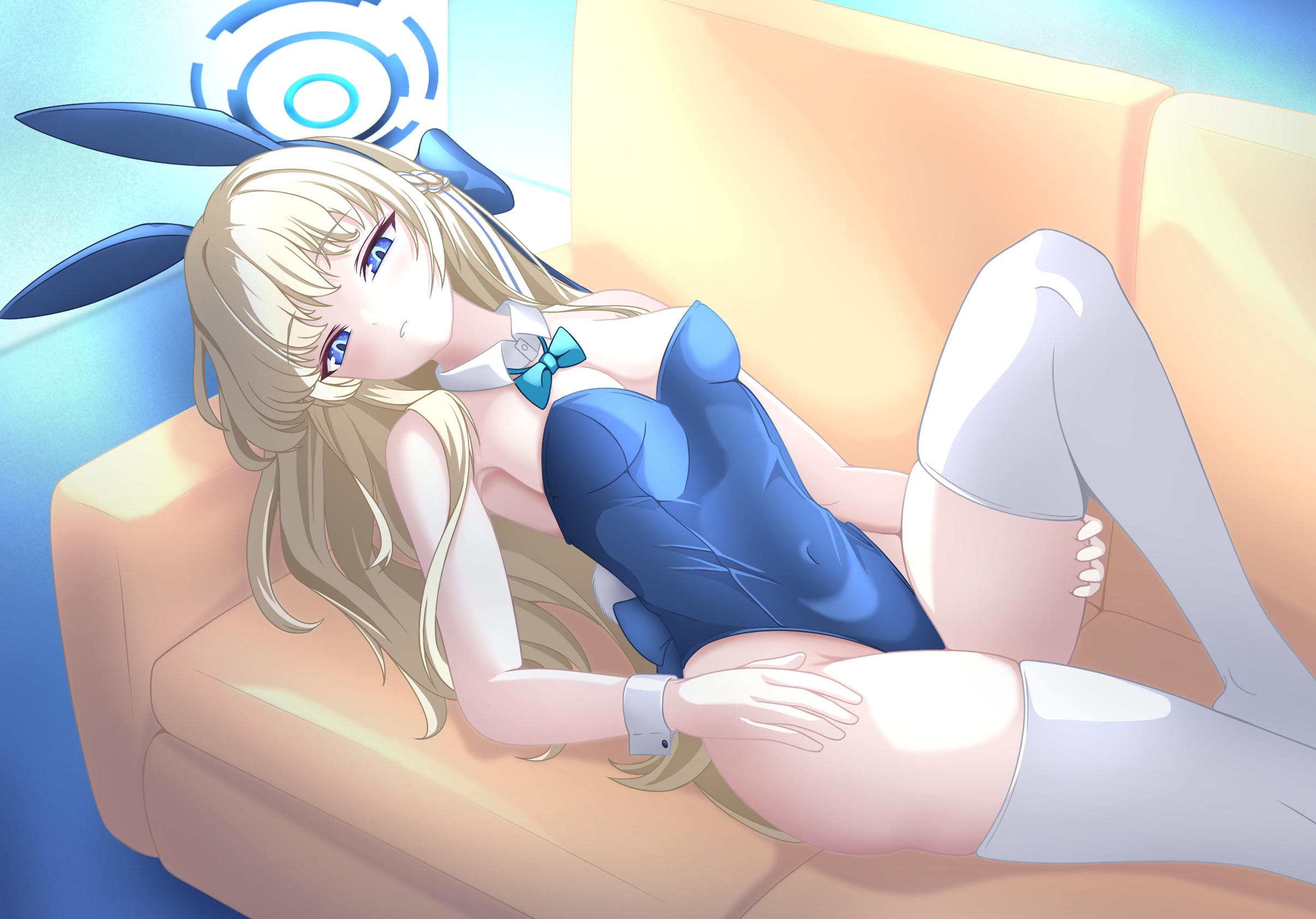 toki (blue archive), toki (bunny) (blue archive), blue archive, highres, 1girl, animal ear hairband, animal ears, aqua bow, aqua bowtie, blonde hair, blue eyes, blue halo, blue leotard, bow, bowtie, breasts, cleavage, couch, detached collar, fake animal ears, feet out of frame, hairband, halo, highleg, highleg leotard, leotard, loang-lipe, long hair, medium breasts, official alternate costume, playboy bunny, rabbit ears, rabbit tail, solo, strapless, strapless leotard, tail, thighhighs, white thighhighs, white wrist cuffs, wrist cuffs