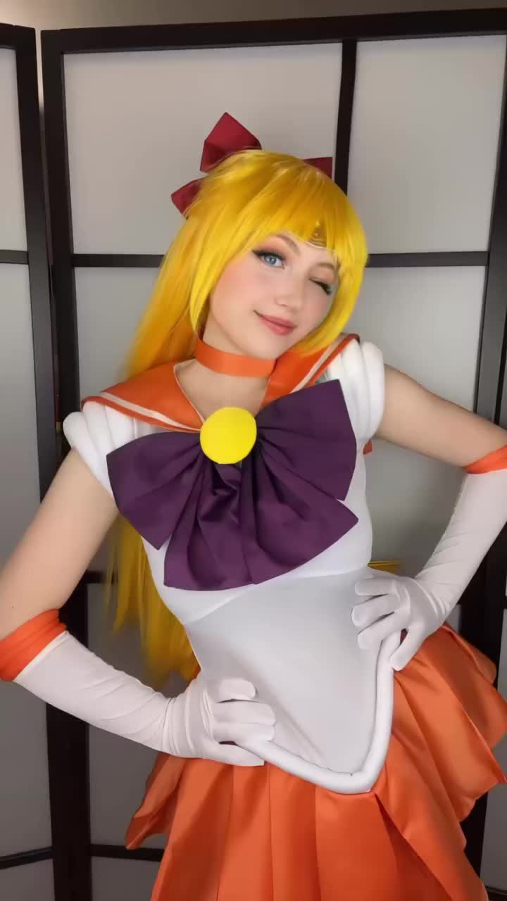 aino minako, sailor venus, bishoujo senshi sailor moon, real life, animated, tagme, video, 1girl, blonde hair, blue eyes, bow, cosplay, ellychan96, gloves, long hair, looking at viewer, miniskirt, one eye closed, red bow, sailor venus (cosplay), short sleeves, skirt, very long hair, wink