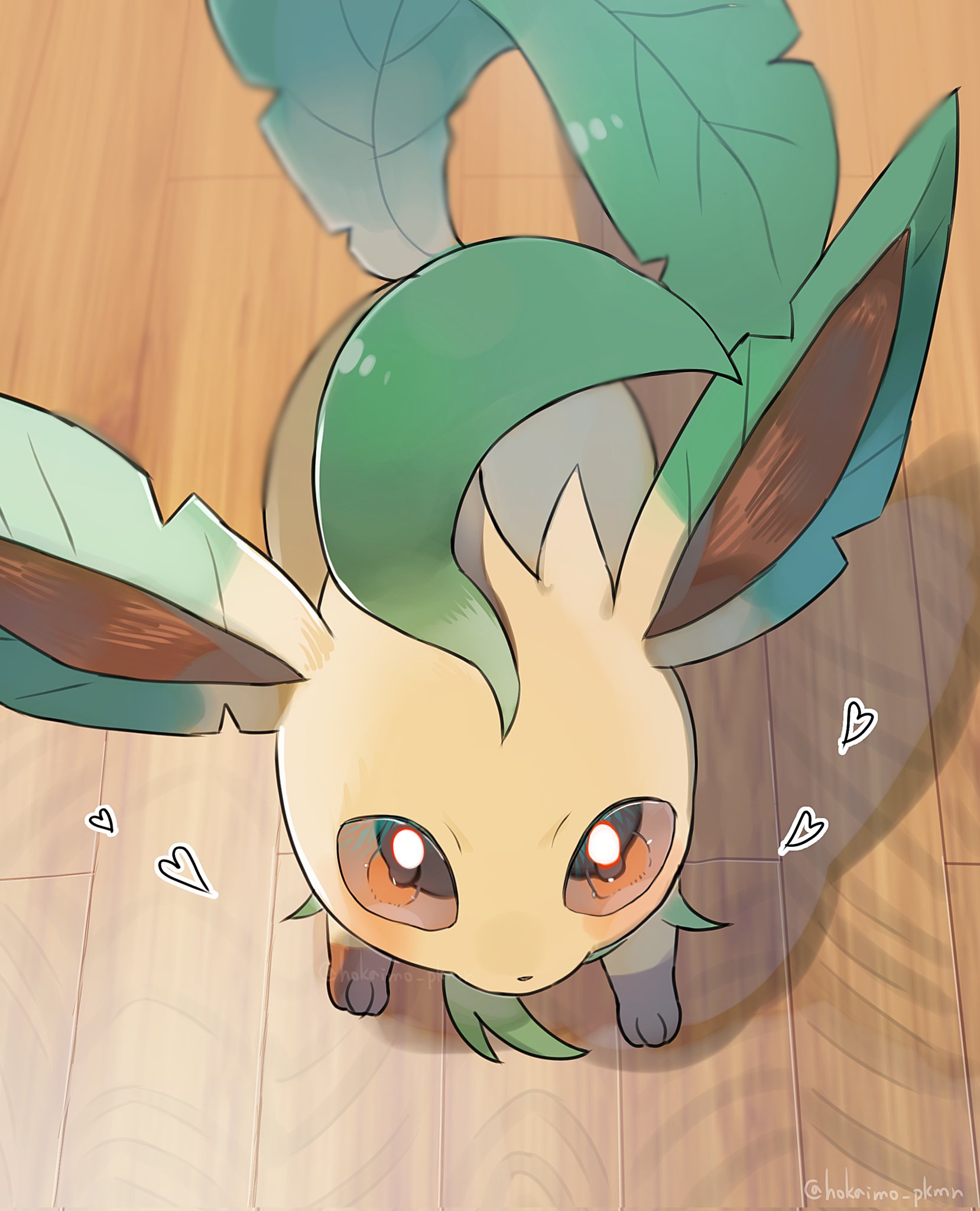 hokaimo pkmn, leafeon, nintendo, pokemon, highres, animal focus, blush, brown eyes, closed mouth, floor, gen 4 pokemon, green fur, leaf, looking at viewer, no humans, pokemon (creature), pokemon focus, solo, tail, wooden floor, yellow fur
