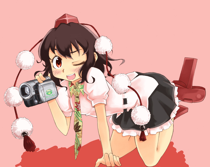 kusogappa, shameimaru aya, touhou, 1girl, brown hair, camcorder, camera, female focus, geta, hat, looking at viewer, one eye closed, open mouth, red eyes, smile, solo, tengu-geta, tokin hat, video camera, wink