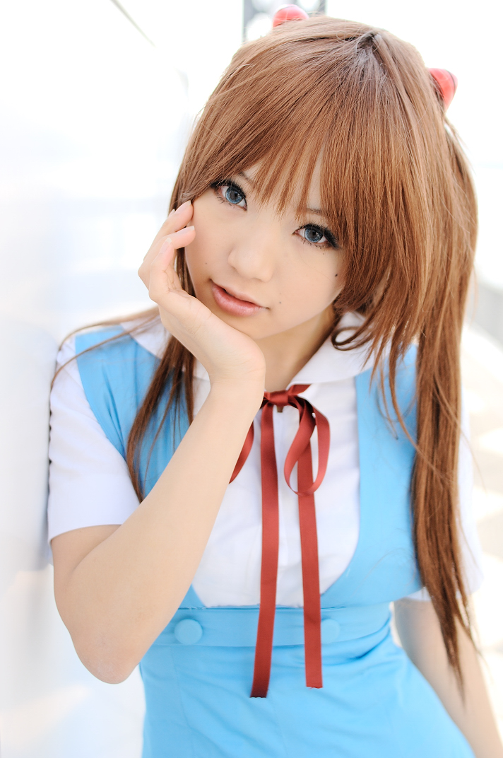 kipi-san, souryuu asuka langley, neon genesis evangelion, photo (medium), 1girl, asian, blue eyes, breasts, color contacts, cosplay, female focus, hairpods, long hair, looking at viewer, mole, orange hair, school uniform, serafuku, small breasts, solo, souryuu asuka langley (cosplay)