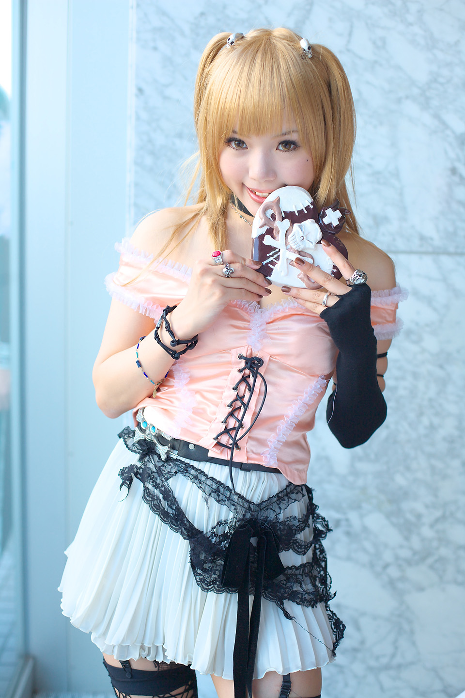 kipi-san, amane misa, death note, highres, photo (medium), 1girl, amane misa (cosplay), asian, bare shoulders, blonde hair, breasts, cosplay, female focus, fingerless gloves, garter straps, gloves, indoors, jewelry, long hair, looking at viewer, miniskirt, mole, ring, single glove, skirt, small breasts, solo, thighhighs, two side up, zettai ryouiki