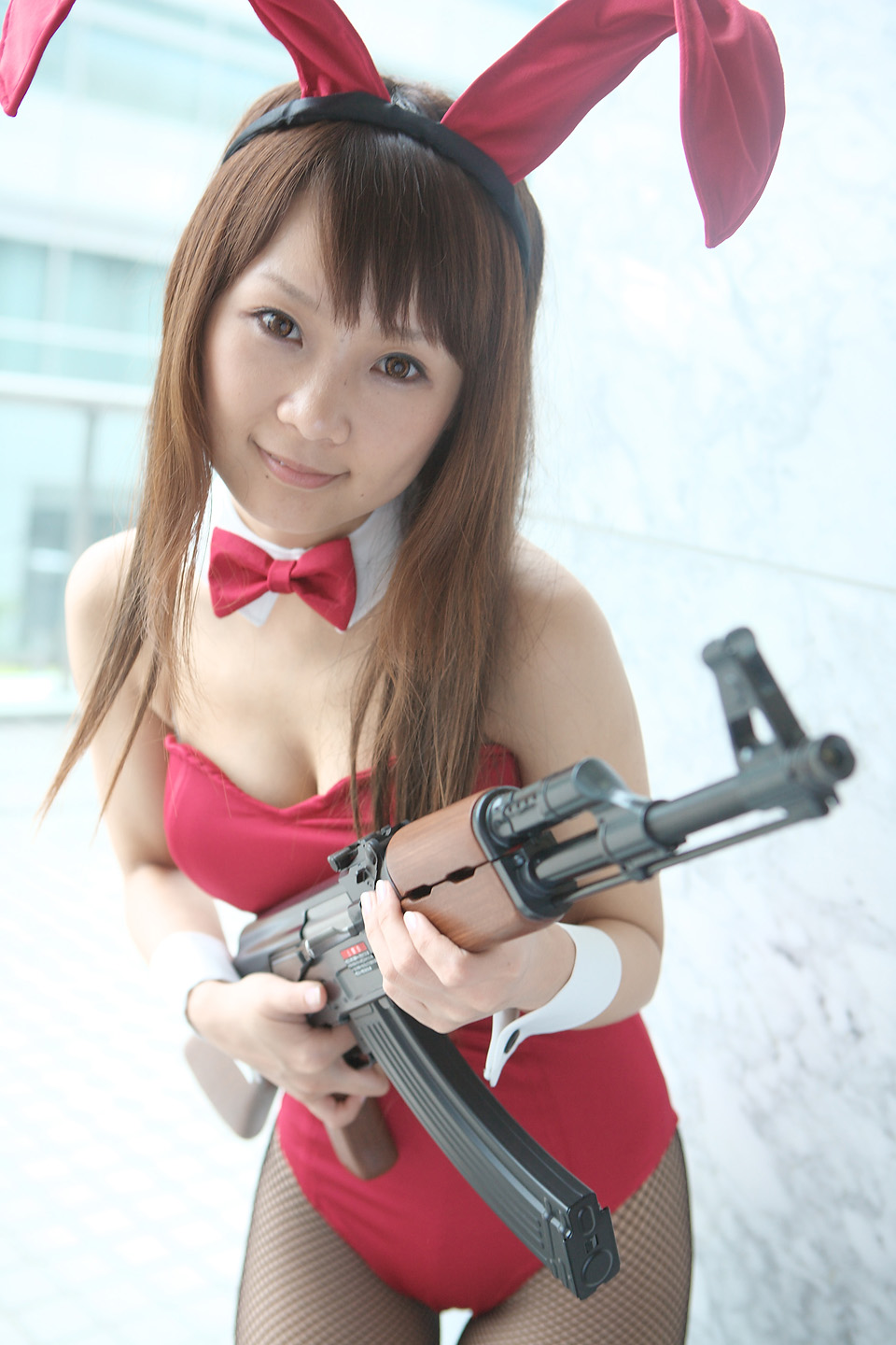 hiromichi, asahina mikuru, suzumiya haruhi no yuuutsu, highres, photo (medium), animal ears, cosplay, gun, rabbit ears, weapon