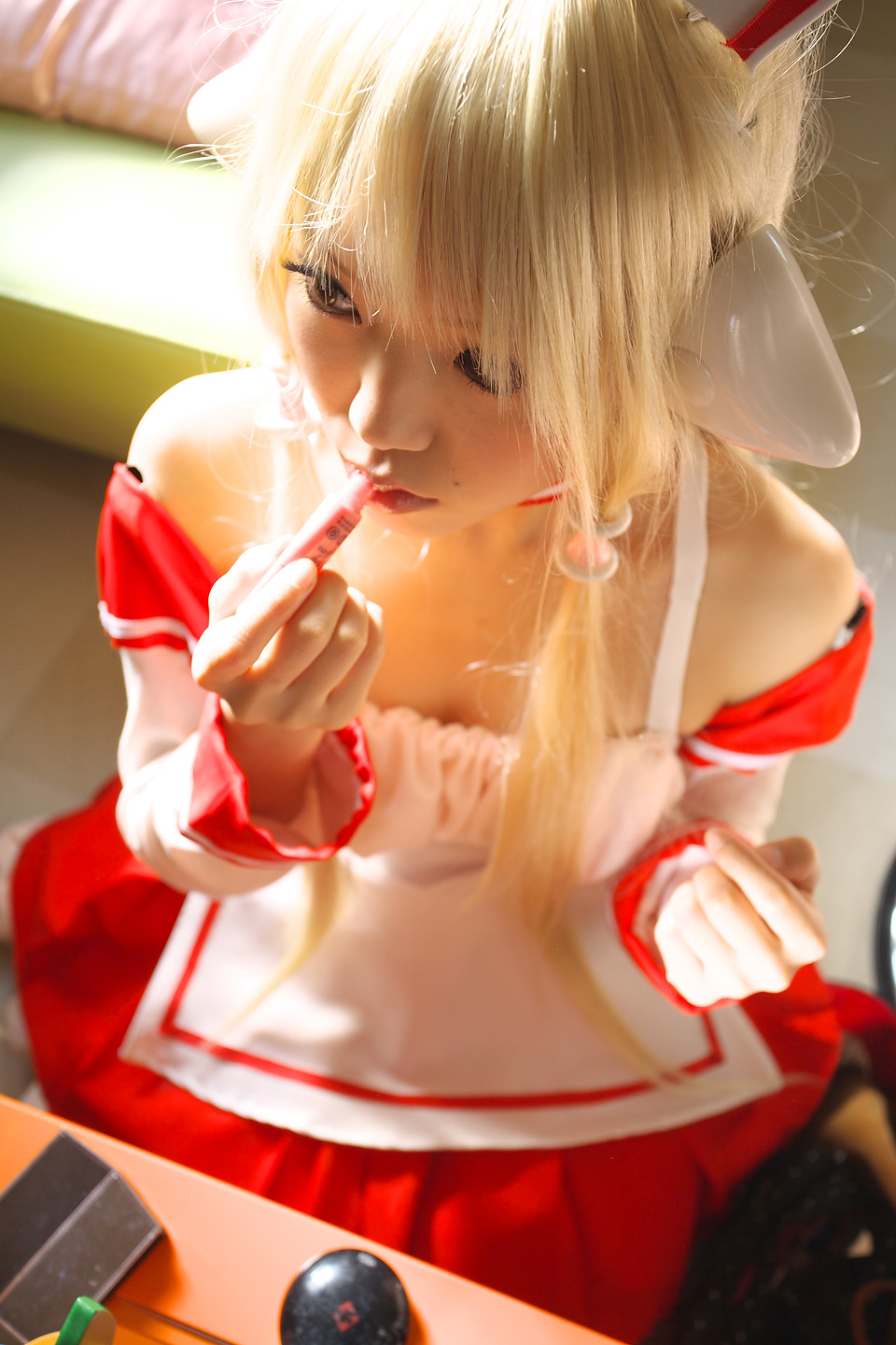 kipi-san, chii, chobits, highres, photo (medium), 1girl, apron, asian, blonde hair, chii (cosplay), cosplay, female focus, indoors, lipgloss, long hair, persocom, solo, waitress, waitress uniform