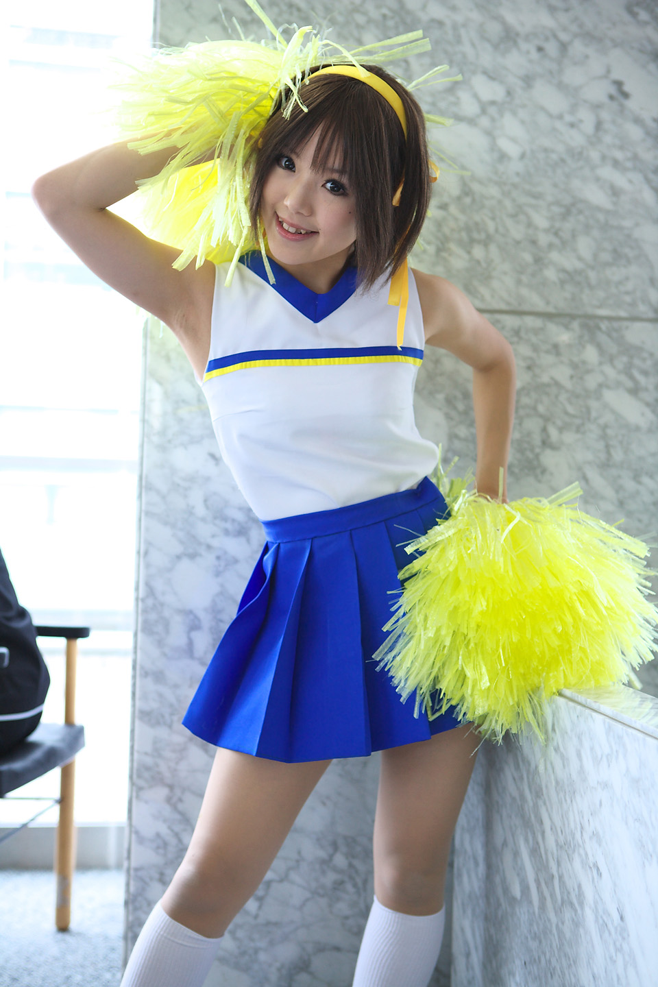 kipi-san, suzumiya haruhi, suzumiya haruhi no yuuutsu, highres, photo (medium), 1girl, asian, brown eyes, brown hair, cheerleader, cosplay, female focus, looking at viewer, mole, pom pom (cheerleading), smile, solo, suzumiya haruhi (cosplay)