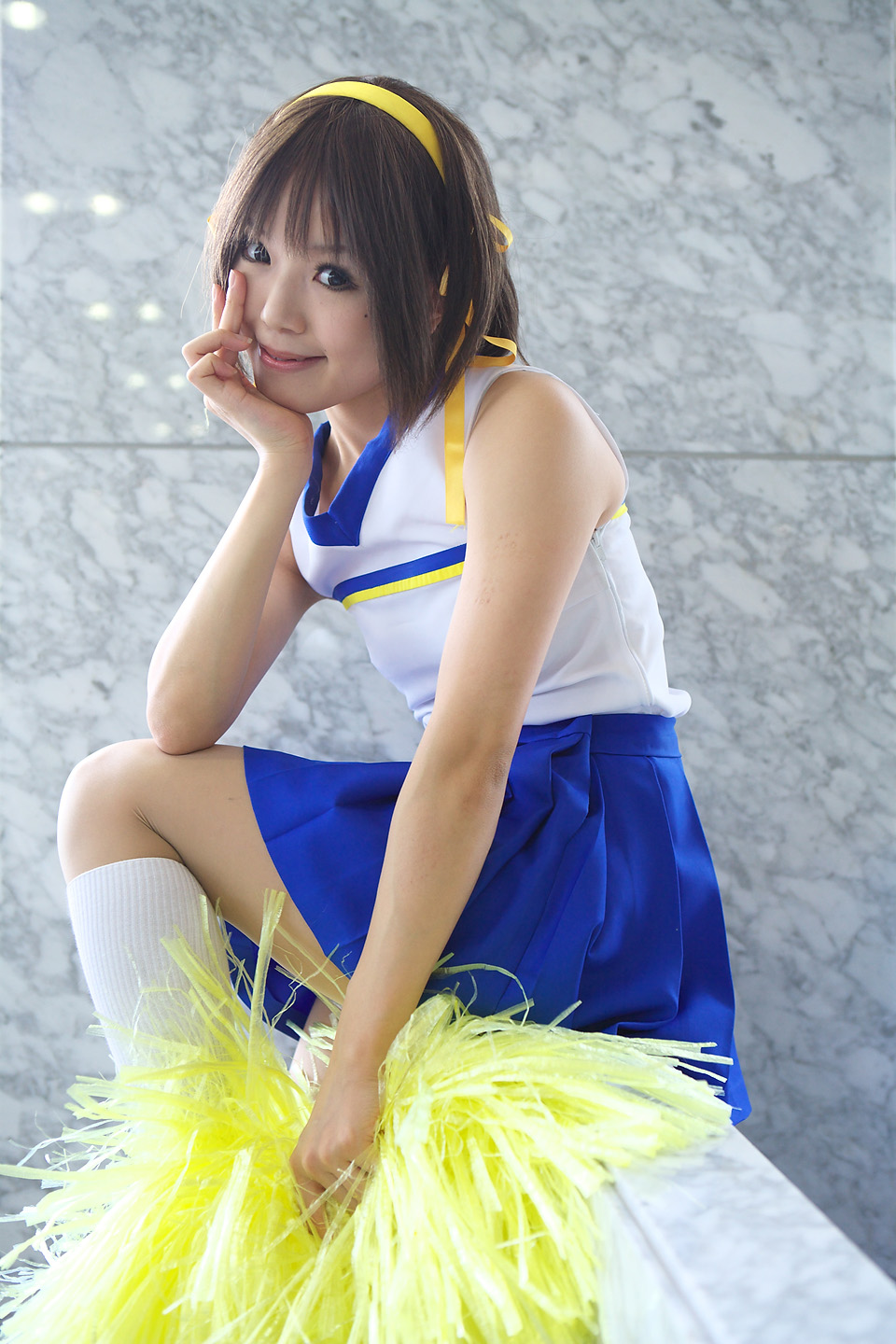 kipi-san, suzumiya haruhi, suzumiya haruhi no yuuutsu, highres, photo (medium), 1girl, asian, brown eyes, brown hair, cheerleader, cosplay, female focus, looking at viewer, mole, pom pom (cheerleading), smile, solo, suzumiya haruhi (cosplay)