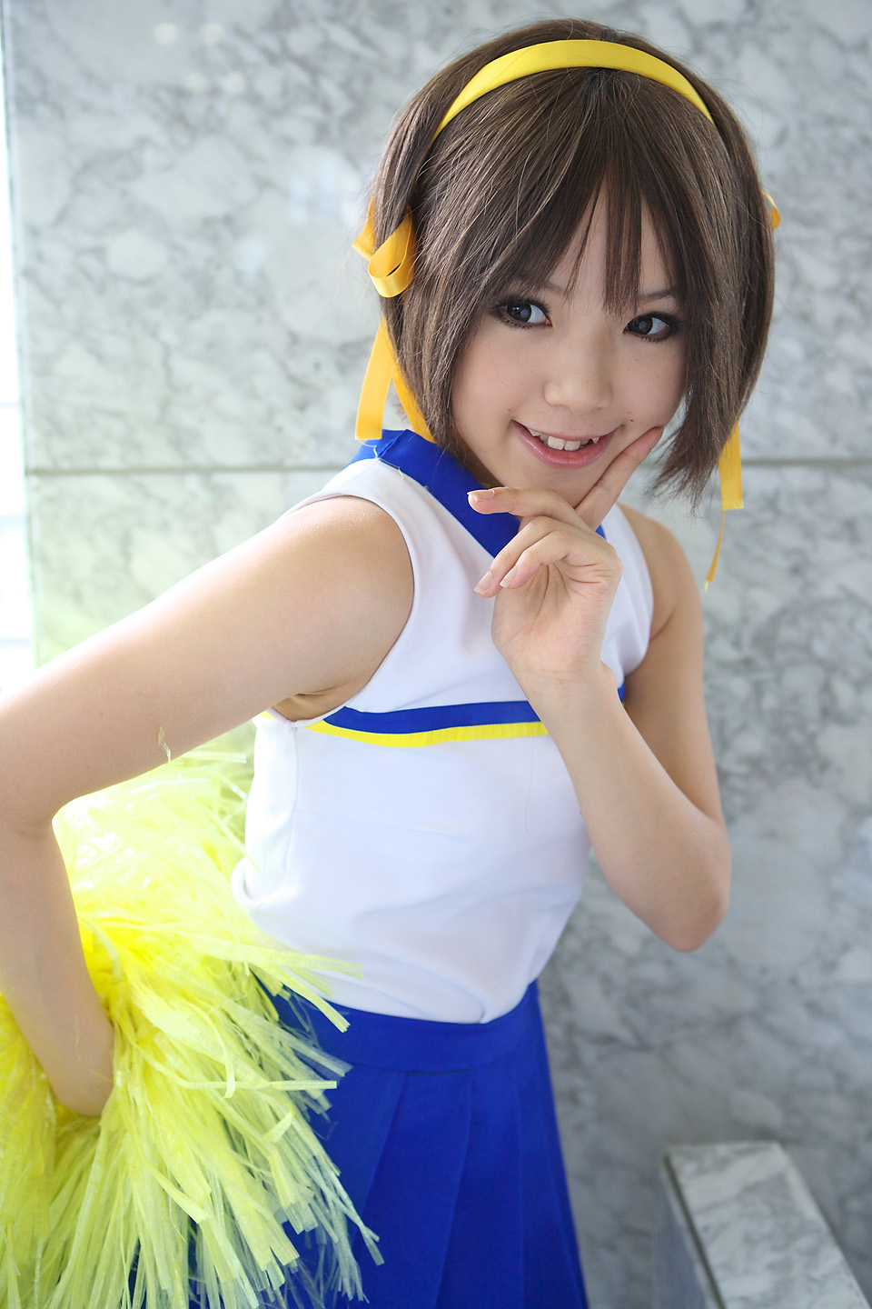 kipi-san, suzumiya haruhi, suzumiya haruhi no yuuutsu, highres, photo (medium), 1girl, asian, brown eyes, brown hair, cheerleader, cosplay, female focus, mole, pom pom (cheerleading), smile, solo, suzumiya haruhi (cosplay)