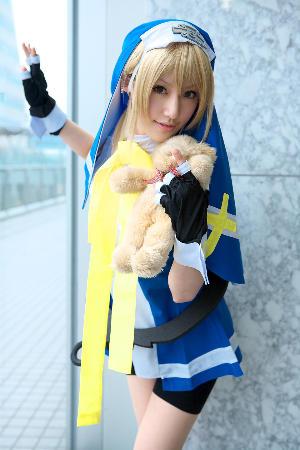 saya (cosplayer), bridget (guilty gear), arc system works, guilty gear, highres, photo (medium), blonde hair, cosplay, teddy bear