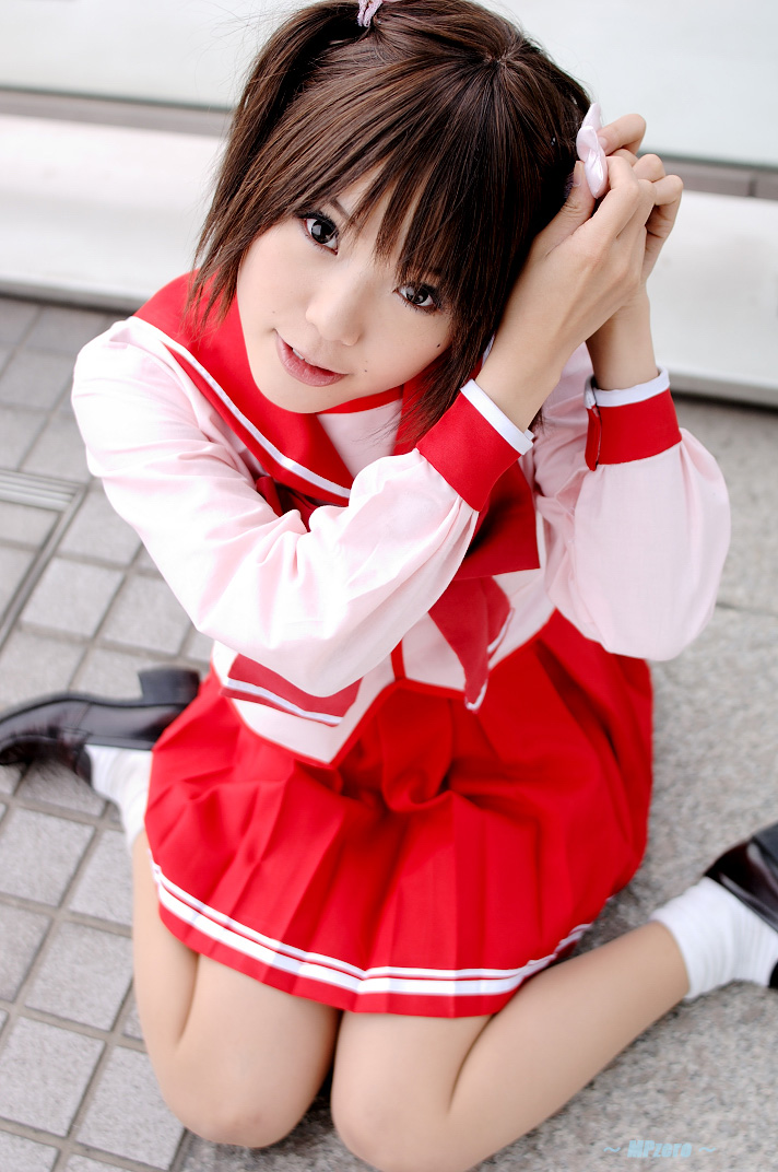 kipi-san, yuzuhara konomi, to heart (series), to heart 2, photo (medium), 1girl, asian, brown hair, cosplay, female focus, looking at viewer, mole, school uniform, serafuku, short hair, sitting, socks, solo, twintails, wariza, yuzuhara konomi (cosplay)