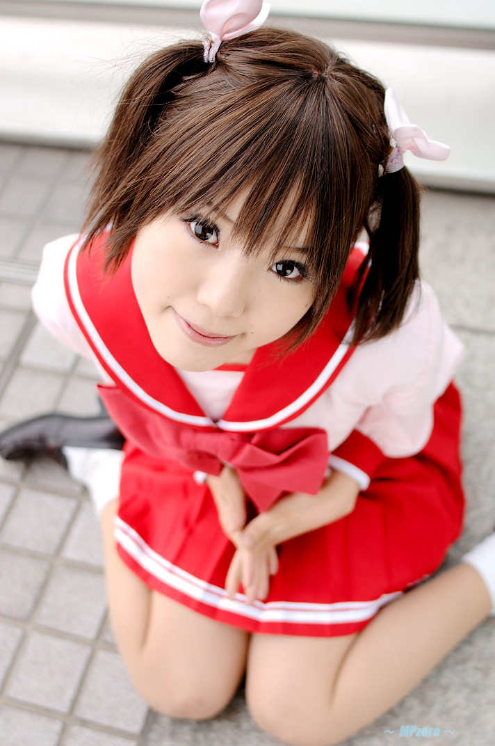 kipi-san, yuzuhara konomi, to heart (series), to heart 2, photo (medium), 1girl, asian, brown hair, cosplay, female focus, looking at viewer, mole, school uniform, serafuku, short hair, sitting, solo, twintails, wariza, yuzuhara konomi (cosplay)