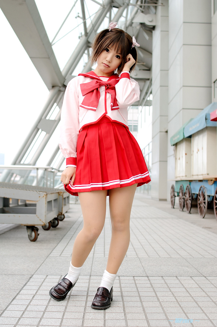 kipi-san, yuzuhara konomi, to heart (series), to heart 2, photo (medium), 1girl, asian, brown hair, cosplay, female focus, looking at viewer, mole, outdoors, school uniform, serafuku, short hair, socks, solo, twintails, yuzuhara konomi (cosplay)