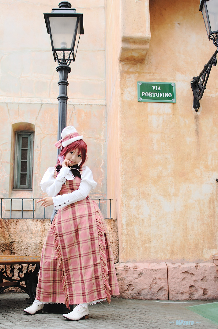 kipi-san, esther blanchett, trinity blood, photo (medium), 1girl, asian, cosplay, dress, esther blanchett (cosplay), female focus, lamppost, looking at viewer, mole, outdoors, puffy sleeves, red hair, road, solo, street