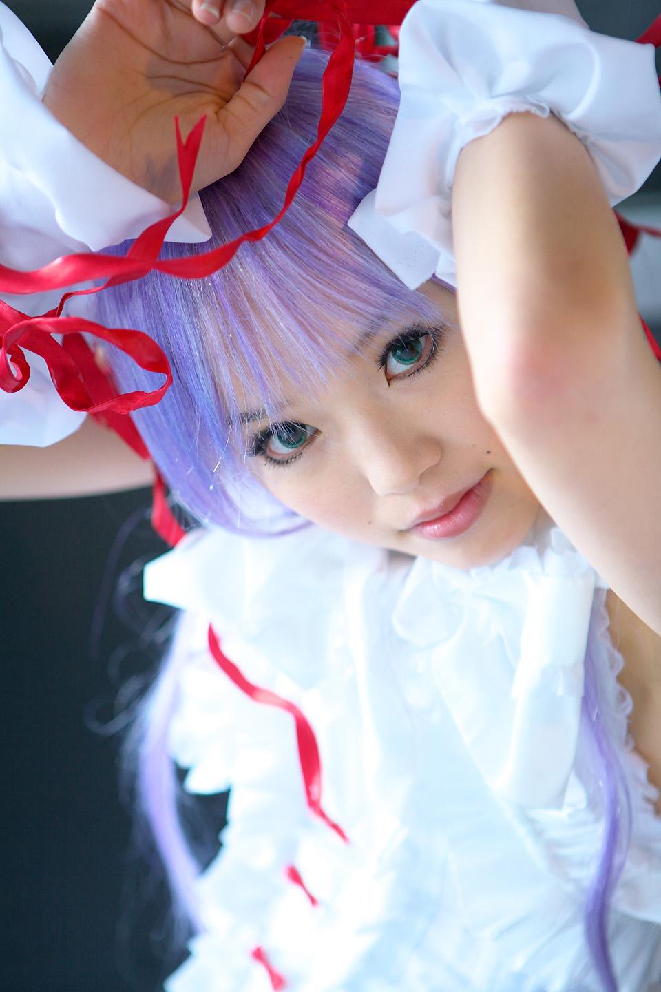 kipi-san, al azif (demonbane), demonbane, highres, photo (medium), 1girl, al azif (cosplay), asian, color contacts, cosplay, dress, female focus, frills, green eyes, hair ribbon, looking at viewer, mole, purple hair, ribbon, solo, wrist cuffs