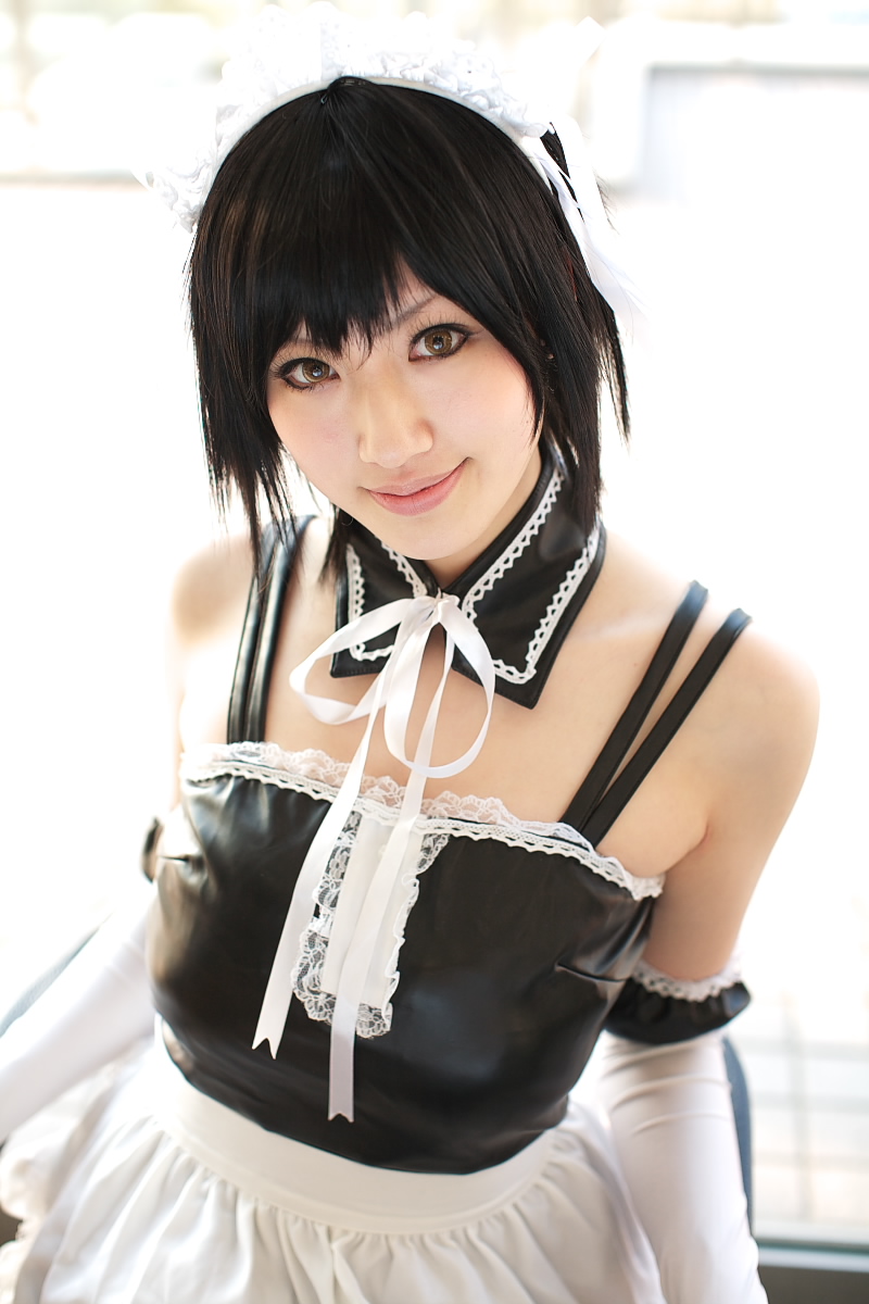 saya (cosplayer), sawatari izumi, kore ga watashi no goshujin-sama, highres, photo (medium), 1girl, apron, asian, bare shoulders, black hair, blurry, chair, cosplay, day, depth of field, detached collar, elbow gloves, facing viewer, female focus, gloves, japanese (nationality), looking at viewer, maid, maid apron, maid headdress, nakabayashi yoshitaka's maid uniform, sawatari izumi (cosplay), short hair, sitting, solo, waist apron, white apron, white gloves, window