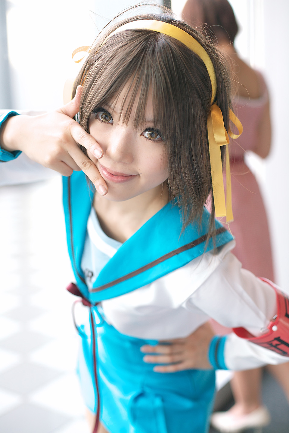 kipi-san, suzumiya haruhi, suzumiya haruhi no yuuutsu, highres, photo (medium), 1girl, armband, asian, brown eyes, brown hair, cosplay, female focus, looking at viewer, mole, school uniform, smile, solo, suzumiya haruhi (cosplay)
