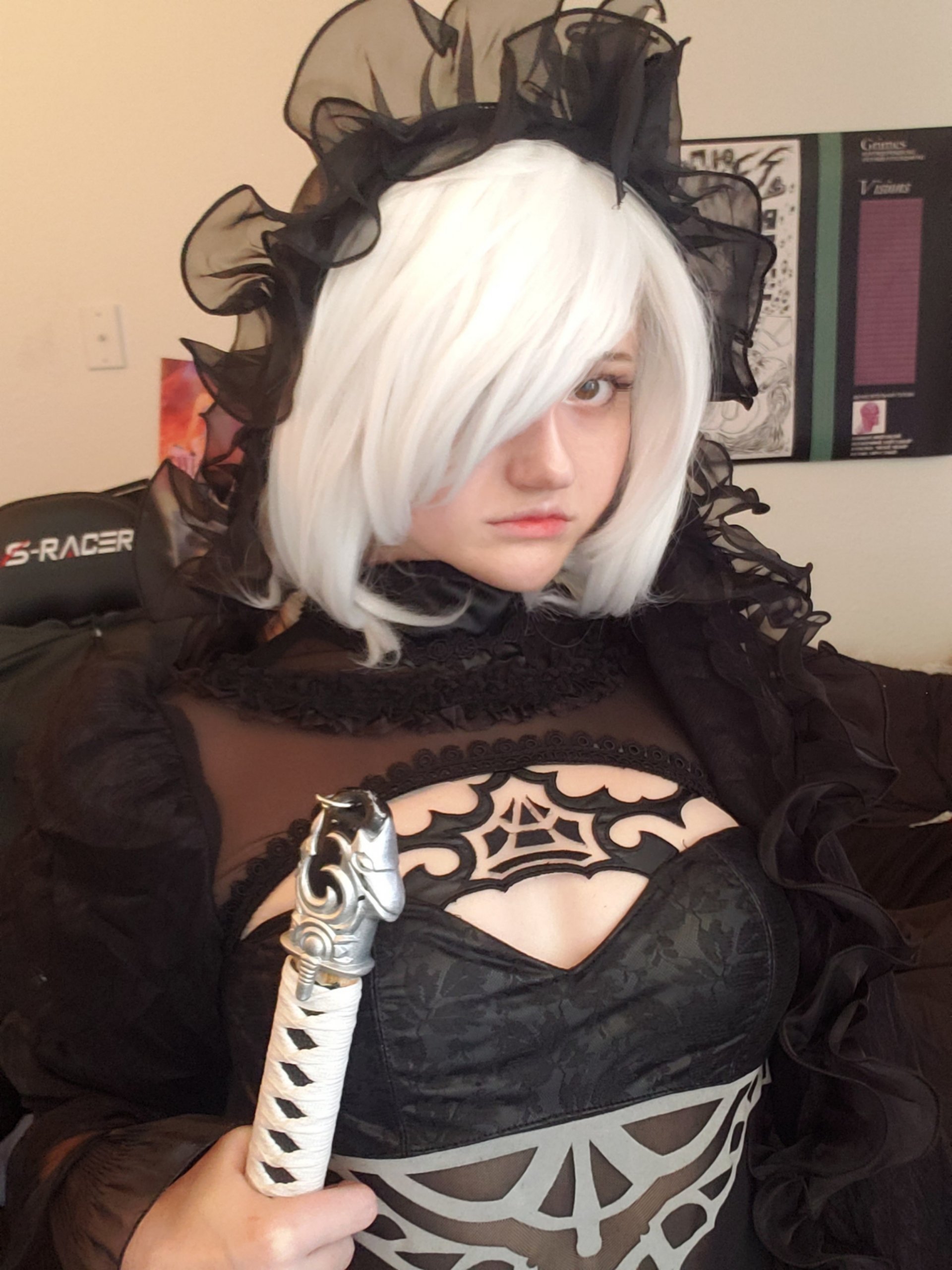 unkyndled, 2b (nier:automata), nier:automata, nier (series), real life, 1girl, 2b (nier:automata) (cosplay), black gloves, black hairband, black leotard, breasts, bridal veil, cosplay, elbow gloves, frilled leotard, frills, gloves, hairband, holding, holding sword, holding weapon, leotard, parted lips, revealing clothes, short hair, sword, thong leotard, upper body, veil, weapon, white hair