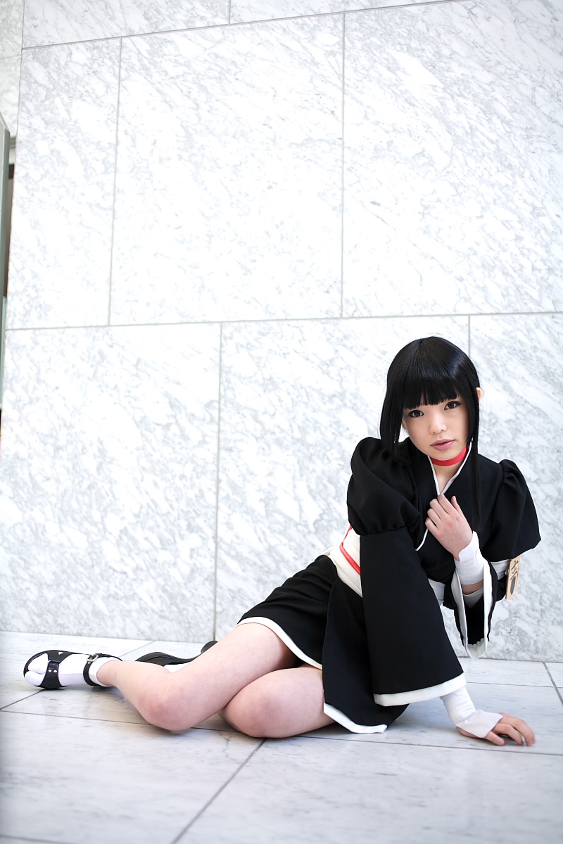 namada, kurotsuchi nemu, bleach, black footwear, white legwear, highres, photo (medium), 1girl, asian, black hair, black kimono, blunt bangs, breasts, cosplay, dutch angle, female focus, full body, indoors, japanese clothes, kimono, looking at viewer, makeup, mascara, on floor, parted lips, puffy sleeves, short kimono, sitting, small breasts, solo, tabi, wide sleeves, yokozuwari