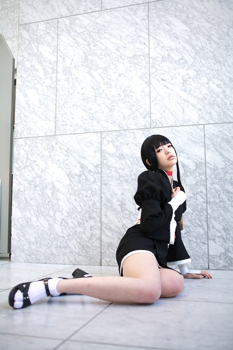 namada, kurotsuchi nemu, bleach, black footwear, white legwear, highres, photo (medium), 1girl, arm support, asian, black hair, black kimono, blunt bangs, breasts, choker, cosplay, eyeshadow, female focus, full body, indoors, japanese clothes, kimono, looking at viewer, makeup, mascara, on floor, parted lips, puffy sleeves, short kimono, sitting, small breasts, solo, tabi, wide sleeves, yokozuwari