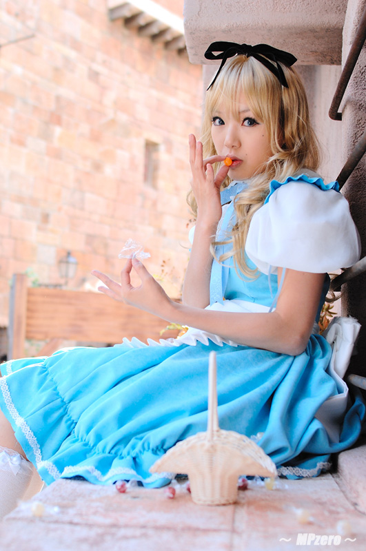 kipi-san, alice (alice in wonderland), alice's adventures in wonderland, photo (medium), 1girl, alice (alice in wonderland) (cosplay), asian, blue eyes, breasts, color contacts, cosplay, female focus, long hair, looking at viewer, petite, sitting, small breasts, solo