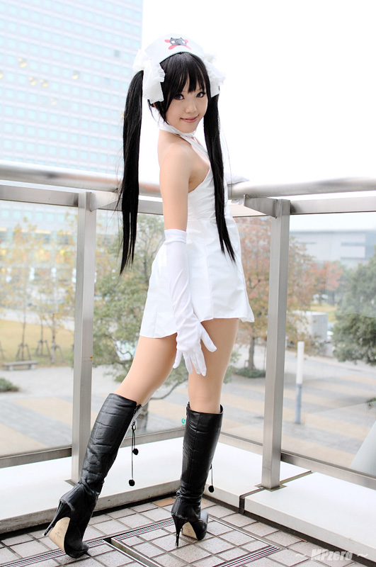 kipi-san, ruriko nasu, pure trance, photo (medium), 1girl, asian, black hair, boots, bow, breasts, cosplay, elbow gloves, female focus, gloves, hair bow, long hair, looking at viewer, looking back, nurse, ruriko nasu (cosplay), small breasts, smile, solo, twintails