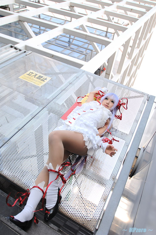kipi-san, al azif (demonbane), demonbane, photo (medium), 1girl, al azif (cosplay), asian, cosplay, dress, dutch angle, female focus, frills, hair ribbon, outdoors, purple hair, ribbon, socks, solo, wrist cuffs