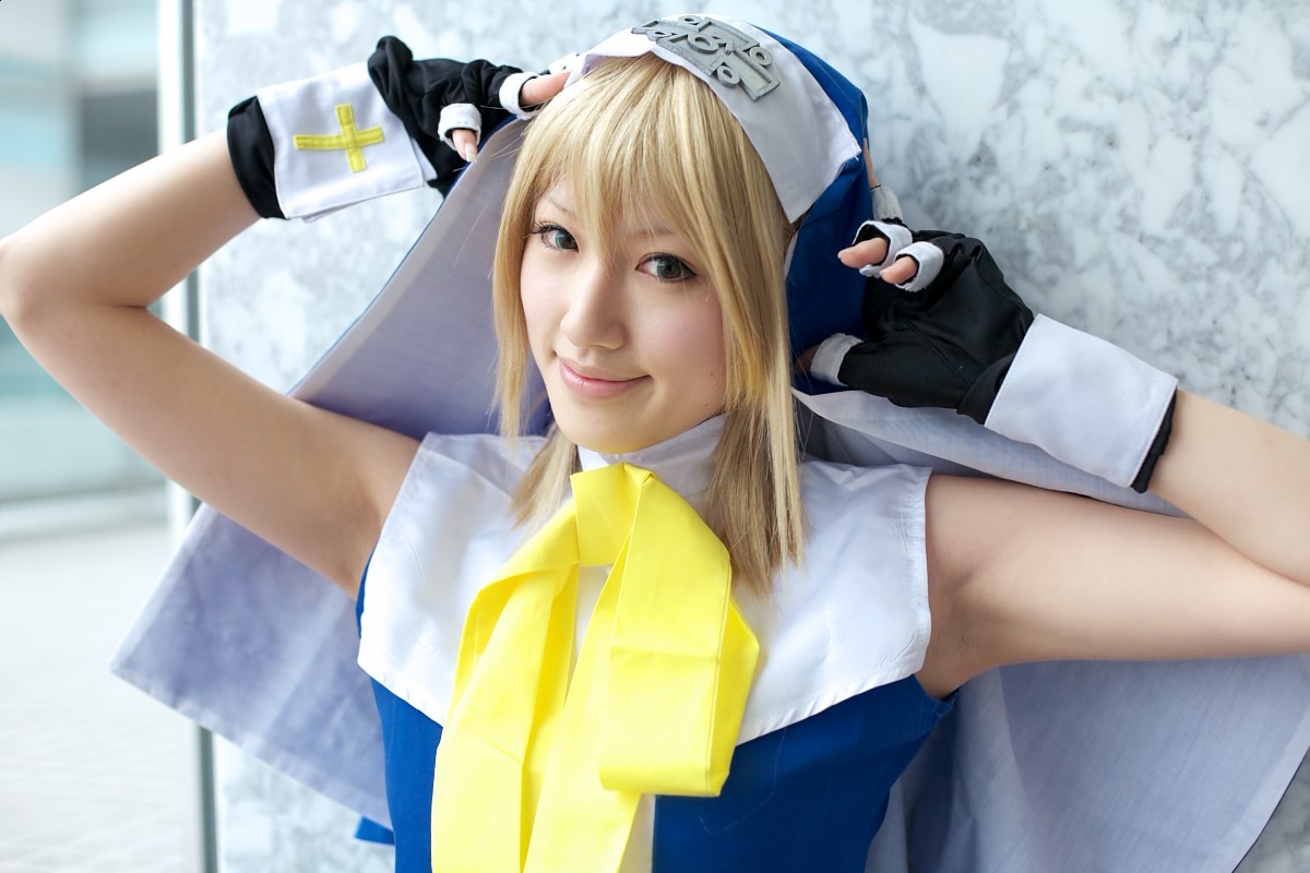 saya (cosplayer), bridget (guilty gear), arc system works, guilty gear, photo (medium), blonde hair, brown eyes, cosplay, cross, solo