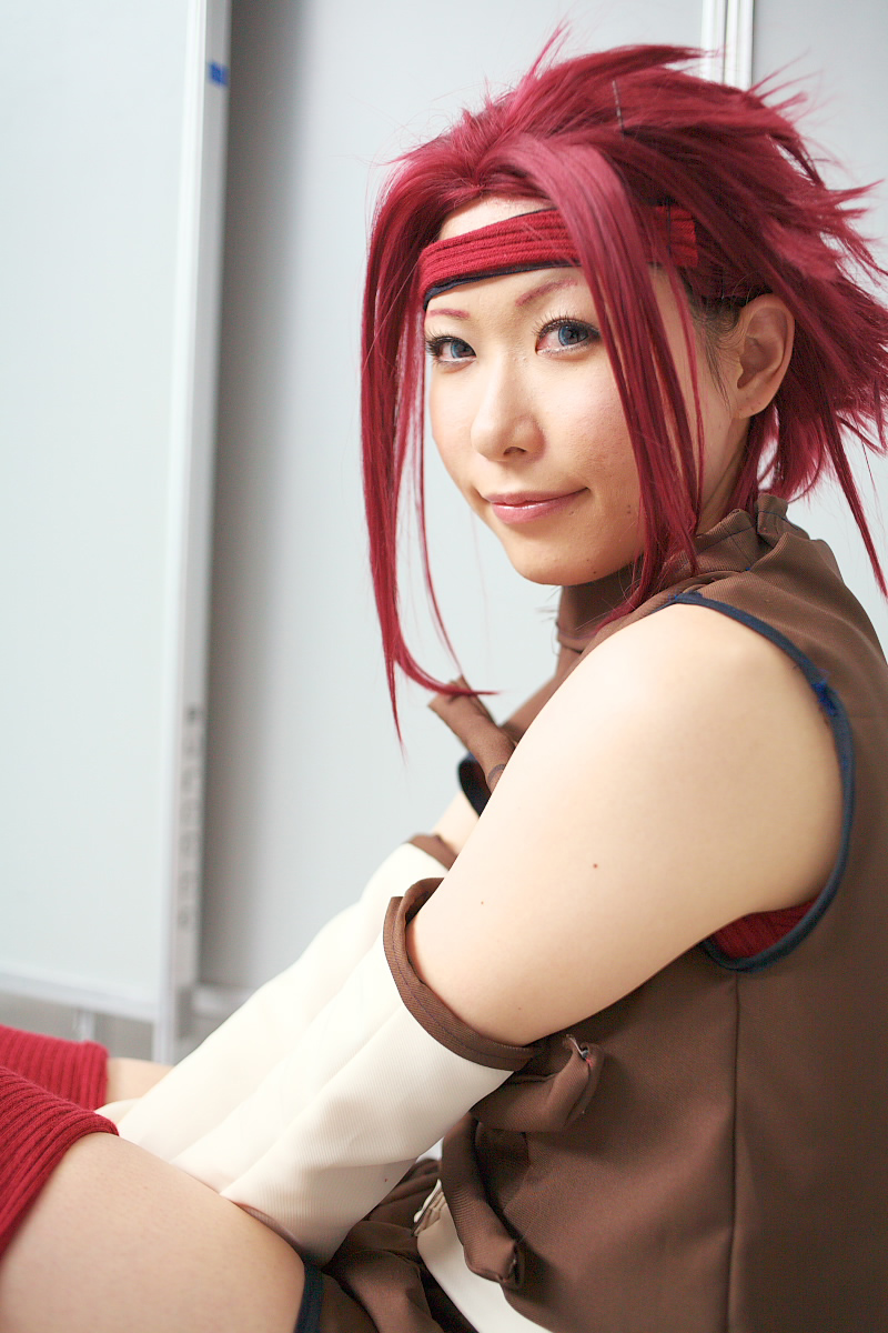 chippi, kouzuki kallen, code geass, highres, photo (medium), 1girl, asian, blue eyes, color contacts, cosplay, female focus, indoors, kouzuki kallen (cosplay), looking at viewer, red hair, short hair, solo