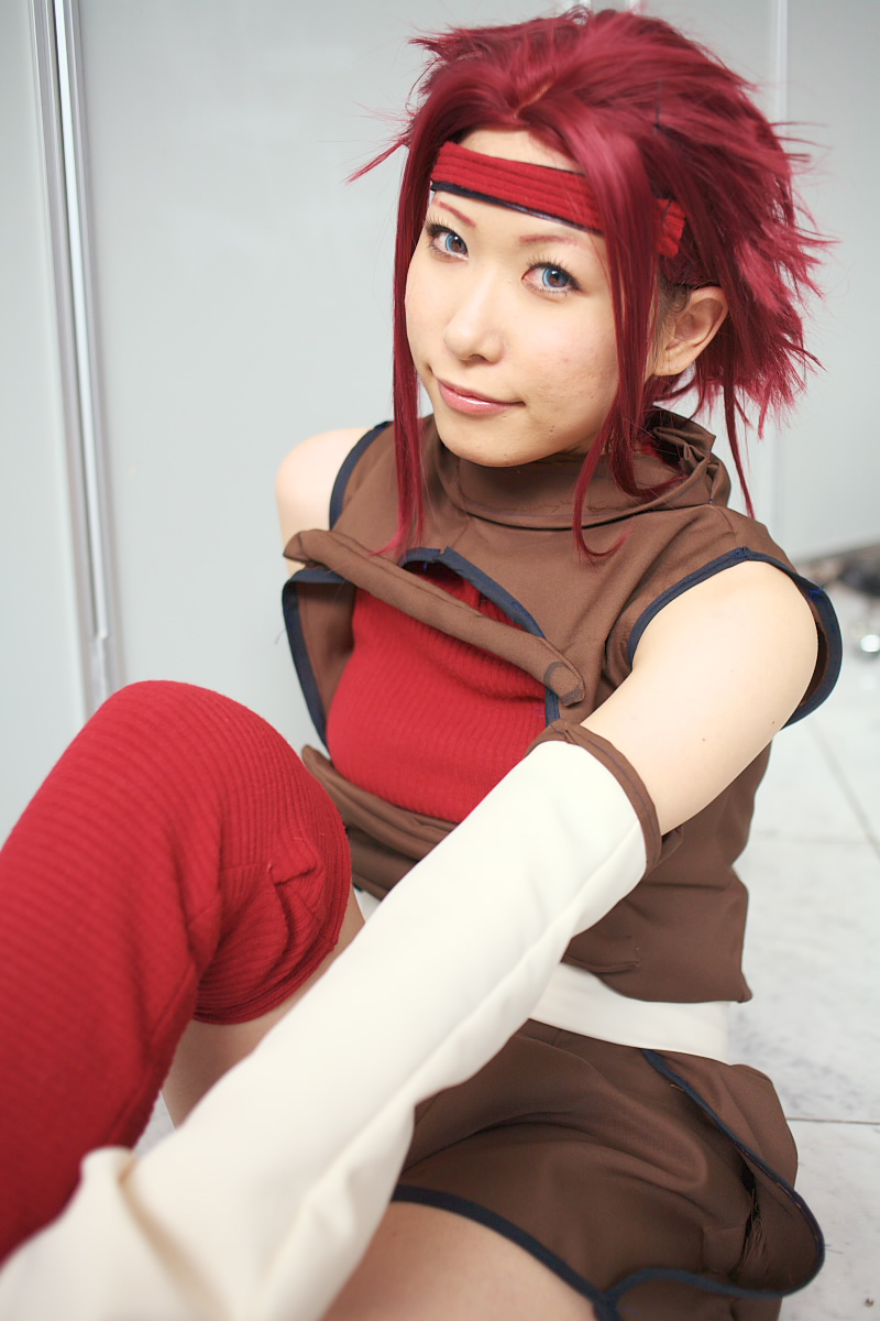 chippi, kouzuki kallen, code geass, highres, photo (medium), 1girl, asian, blue eyes, color contacts, cosplay, female focus, indoors, kouzuki kallen (cosplay), looking at viewer, red hair, short hair, solo