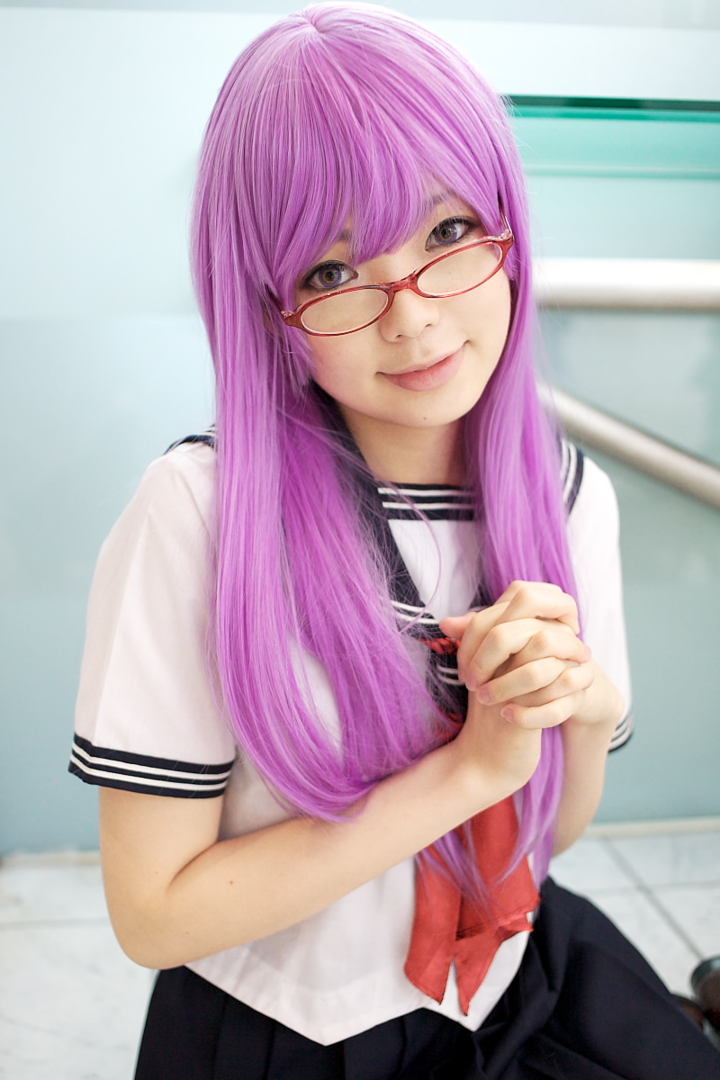 namada, sarutobi ayame, gintama, highres, photo (medium), 1girl, asian, blurry, breasts, color contacts, cosplay, depth of field, female focus, glasses, head tilt, indoors, looking at viewer, looking over eyewear, matching hair/eyes, on floor, purple eyes, purple hair, sailor, school uniform, serafuku, short sleeves, sitting, small breasts, solo, tile floor, tiles, yokozuwari